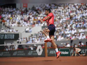 Novak Djokovic nears his 23rd Grand Slam title at the French Open after Carlos Alcaraz cramps up