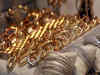 Silver tumbles by Rs 5,500, gold down by Rs 300 on global cues