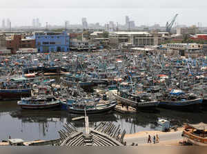 Anchored fishing boats, seen following the cyclonic storm, Biparjoy, over the Arabian Sea, at Fish Harbour, in Karachi