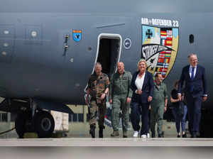 (L-R) German Lieutenant General Martin Schelleis, German Air Force Lieutenant General Ingo Gerhartz, the Parliamentary Commissioner for the German Armed Forces Bundeswehr Eva Hoegl and State Premier of Lower Saxony Stephan Weil leave an Airbus A400M military aircraft of the German Armed Forces Bundeswehr during the Air Defender Exercise 2023 at the military air base in Wunstorf, northern Germany, on June 12, 2023. The Air Defender 2023 is a multinational air operation exercise in European airspace under the command of the German Air Force taking place from June 12 to June 23, 2023. (Photo by Ronny Hartmann / AFP)