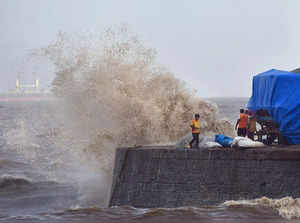 Mumbai: High tides crash at the sea front at Colaba, ahead of cyclone Biparjoy’s...