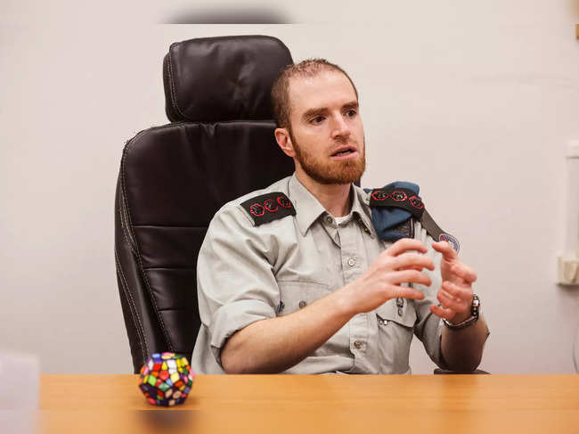 Colonel Eli Birenbaum, commander of the Israeli military's Matzpen operational data and applications unit, speaks to Reuters at his office in an IDF base in Ramat Gan