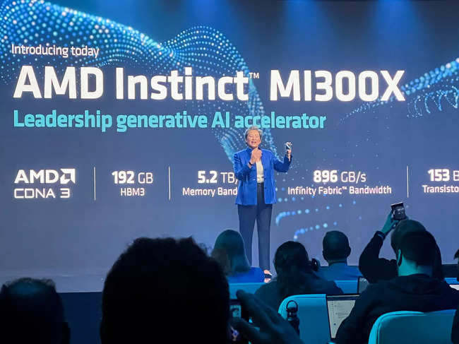 AMD Chief Executive Lisa Su holds the company's new MI300X chip at an event outlining AMD's artificial intelligence strategy in San Francisco