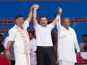 Bengaluru: Congress leader Rahul Gandhi with Karnataka CM-designate and Dy CM-de...