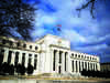 Fed pauses interest rate hikes but signals more tightening to come