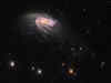 700 million light-years away! Jellyfish galaxy JO 206 swims across Hubble Telescope's lens