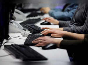 FILE PHOTO: Employees, mostly veterans of military computing units, use keyboards as they work at a cyber hotline facility at Israel's Computer Emergency Response Centre (CERT) in Beersheba, southern Israel