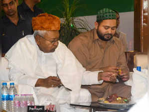 Patna: Bihar CM Nitish Kumar and Deputy CM Tejaswi Yadav during an Iftar partyin...