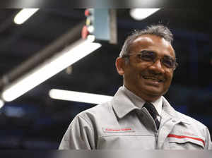 (FILES) Nissan Motor's chief operating officer Ashwani Gupta speaks at a press conference to announce the construction of a gigafactory at Nissan's plant in Sunderland, north east England on July 1, 2021. Top Nissan executive Ashwani Gupta is leaving the company, the Japanese automaker confirmed June 16, 2023, a day after reports of a leadership clash inside the company. (Photo by Oli SCARFF / AFP)