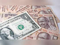 Rupee gains to sub-82/dollar on bets of less aggressive Fed