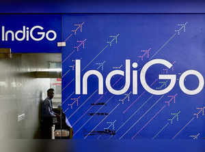 A person is seen inside an IndiGo airlines ticketing office at Chhatrapati Shivaji International airport in Mumbai
