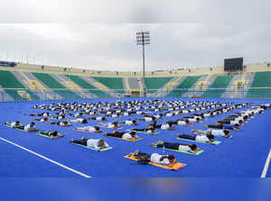 New Delhi: Yoga enthusiasts perform yoga during the Yoga Mahotsav 2023 on the ev...