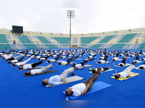 New Delhi: Yoga enthusiasts perform yoga during the Yoga Mahotsav 2023 on the eve of the International Day of Yoga, at Major Dhyan Chand National Stadium, in New Delhi, on Tuesday, June 20, 2023. (Photo: IANS/PIB)
