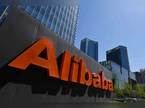 CORRECTION / (FILES) This file photo taken on April 13, 2021 shows an Alibaba sign outside the company's office in Beijing.   Chinese tech giant Alibaba announced on June 20, 2023 that it will replace chairman and CEO Daniel Zhang with current executive vice chairman Joseph Tsai as chairman and Eddie Wu as CEO in September. (Photo by GREG BAKER / AFP)