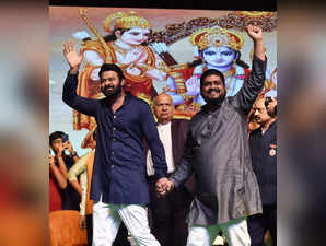 New Delhi: Actor Prabhas with film director Om Raut during Dussehra celebrations...