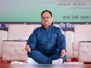 Gurugram: BJP National President JP Nadda performs yoga during a session on the International Day of Yoga, at Tau Devi Lal Stadium in Gurugram, Wednesday, June 21, 2023.  (Photo: IANS/Twitter)