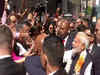 PM Narendra Modi meets people outside hotel in New York