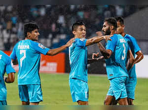 Bengaluru: Indian captain Sunil Chhetri with teammates celebrates after scoring ...