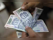 Rupee ends stronger on broad dollar fall; forward premiums inch up