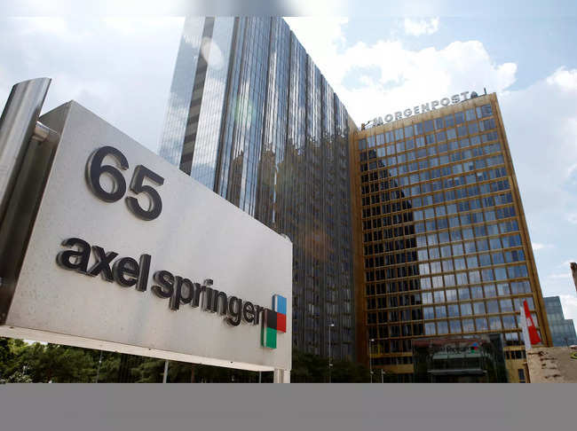 FILE PHOTO: The logo of German publisher Axel Springer is pictured in front of the company's headquarters in Berlin