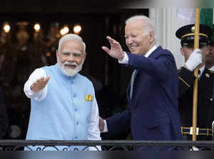 India's Prime Minister Narendra Modi and President Joe Biden wave from the Blue ...