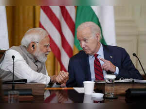 President Joe Biden speaks with India's Prime Minister Narendra Modi and America...