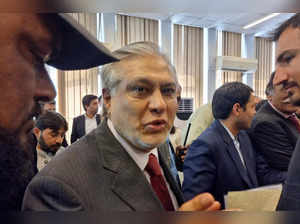 FILE PHOTO: Pakistan's Finance Minister Ishaq Dar leaves after post-budget press briefing for the 2023/24, in Islamabad