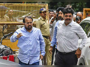 Mumbai: Shiv Sena (UBT) leader Suraj Chavan arrives to appear before the Enforce...
