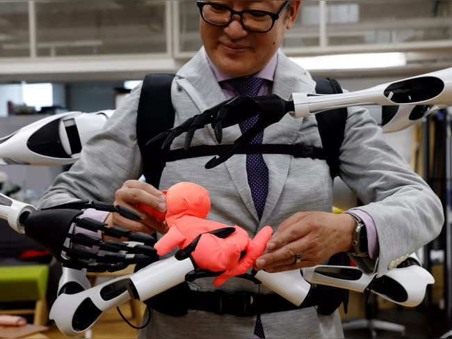 Japanese researchers develop robot arms to 'stimulate creativity' in Tokyo