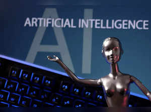 FILE PHOTO: Illustration shows AI Artificial Intelligence words