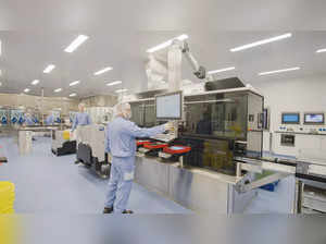 Employees work in the manufacturing of Pfizer’s new respiratory syncytial virus (RSV) vaccine Abrysvo