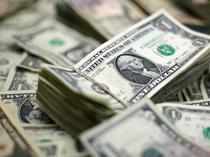 Dollar flat; Aussie slides as inflation slows