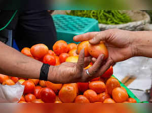 New Delhi: Tomatoes being sold at a market, in New Delhi. Tomato prices have soa...