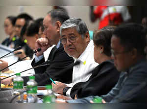 Department of Foreign Affairs Secretary Enrique Manalo (C) attends the senate foreign relations committee hearing on the discussion to temporarily house thousands of Afghans awaiting resettlement in the United States, at the Senate in Manila on June 16, 2023. (Photo by JAM STA ROSA / AFP)