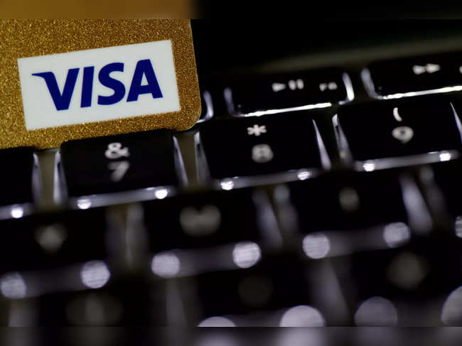 FILE PHOTO: A Visa credit card is seen on a computer keyboard in this picture illustration