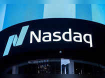 Nasdaq edges up, S&P 500, Dow decline slightly; more Fed rate hikes in focus
