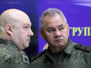 FILE PHOTO: Russian Defence Minister Sergei Shoigu and General Sergei Surovikin visit the Joint Headquarters of the Russian armed forces, in an unknown location