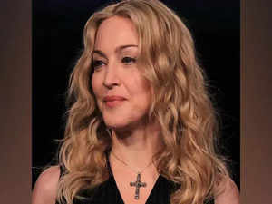Pop icon Madonna postpones world tour after battling serious infection
