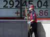 Asia shares edge lower on rate hike worries, yen frail