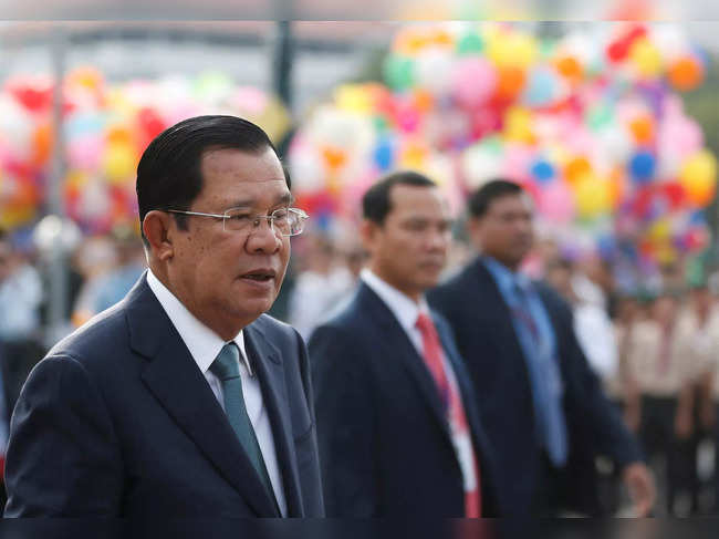 FILE PHOTO: Cambodia's Prime Minister Hun Sen attends a celebrations marking the 66th anniversary of the country's independence from France, in central Phnom Penh