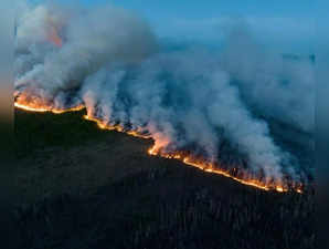 Undated aerial photo provided by BC Wildfire Service on June 9, 2023 shows wildfires burning in Northeast region of British Columbia, Canada.(BC Wildfire Service/Handout via Xinhua/IANS)