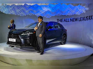 Greater Noida: President of Lexus India Naveen Soni (R) at the launch of the Lex...