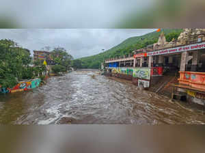 Junagadh: A street is seen flooded after heavy monsoon rains, in Junagarh. (PTI ...
