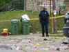 Baltimore witnesses largest mass shooting in 10 years; 2 killed and 28 injured at block party as gunman still at large
