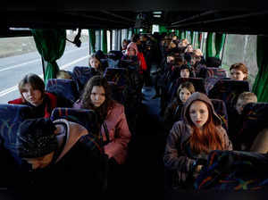 FILE PHOTO: Children taken to Russia wait for departure to Kyiv after returning via the Ukraine-Belarus border in Volyn region