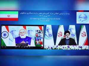 Iranian President Raisi attends the SCO meeting via video link at the Office of the President of Iran, in Tehran