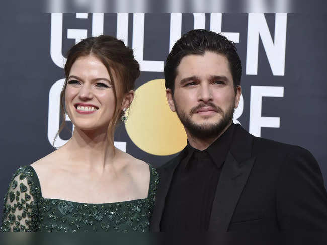 FILE - Rose Leslie, left, and Kit Harington arrive at the 77th annual Golden Globe Awards on Jan. 5, 2020, in Beverly Hills, California.