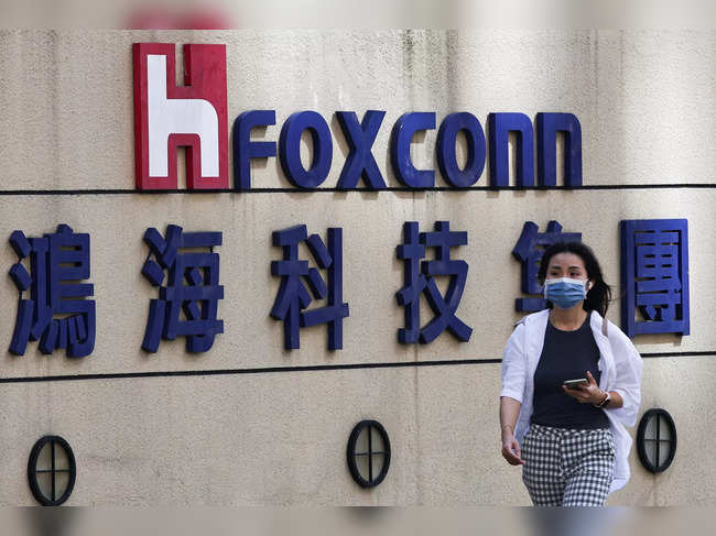 FILE PHOTO: Foxconn Q2 sales slip 14%, Q3 outlook brighter ahead of year-end peak
