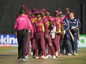 West Indies players shake hands after loosing to Scotland in their ICC Men's Cri...