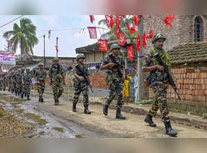 Nadia: Security personnel conduct a route march ahead of the West Bengal panchay...